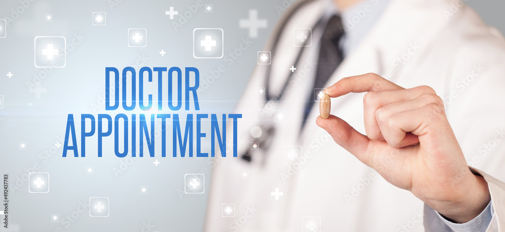 Close-up of a doctor giving a pill Close-up of a doctor giving a pill