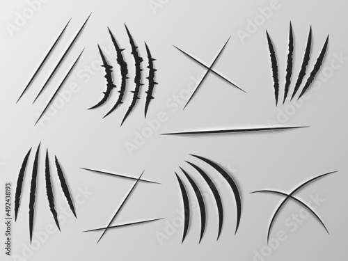 Realistic knife cut. Sharp blade carved effect. Paper incision. Wild animal claws marks. Beast rough slash scratches. Torn surface. Nail tear traces. Vector various shapes carving set