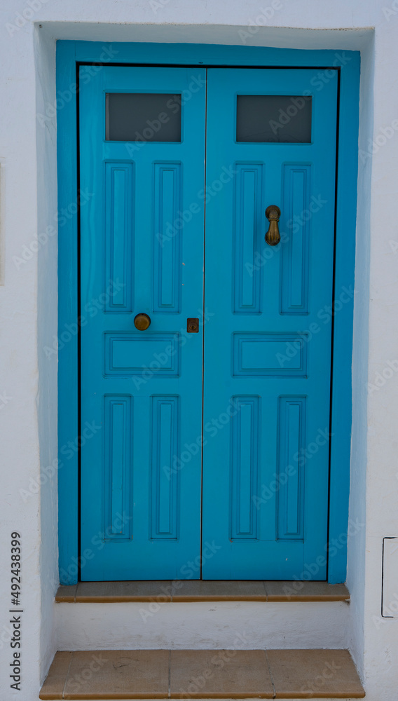 PUERTA AZUL EN UN PUEBLO DE ANDALUCIA Stock Photo | Adobe Stock