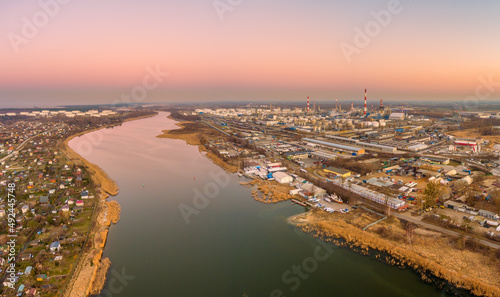 aerial view of gdansk oil refinery at sunset
