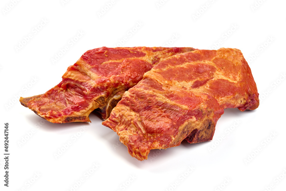 Smoked pork ribs, isolated on white background. High resolution image. Smoked pork ribs, isolated on white background. High resolution image.