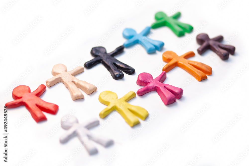 multicolored clay figurines on white background multicolored clay figurines on white background