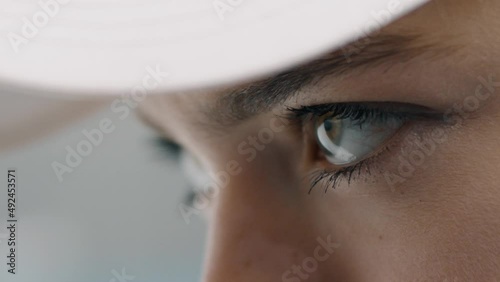 Girl tennis player confidently looks at the game
