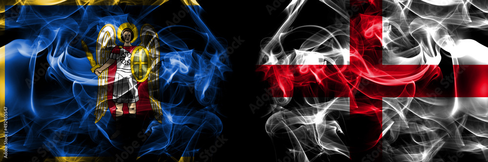 Kyiv, Kiev vs England, English flag. Smoke flags placed side by side isolated on black background.