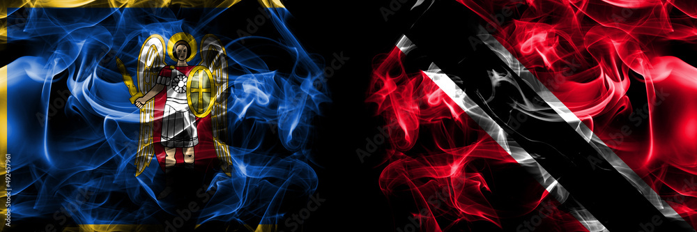 Kyiv, Kiev vs Trinidad and Tobago flag. Smoke flags placed side by side isolated on black background.