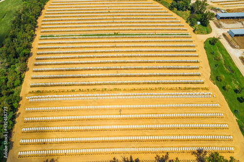 Aerial Shot of Large Cattle raising facility with rows of Calf Pens  photo