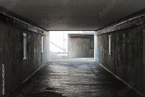 The light at the end of the tunnel with multiple possibilities. Left to the light and right continues in darkness.