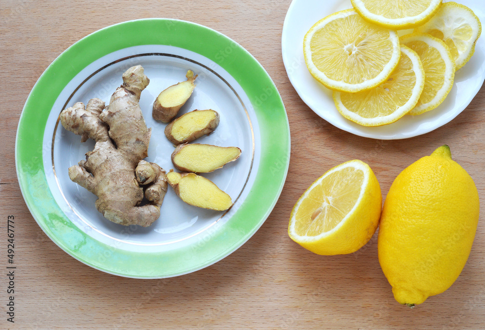 Ginger and lemon wedges. Healthy food. Ginger and lemon wedges. Healthy food.
