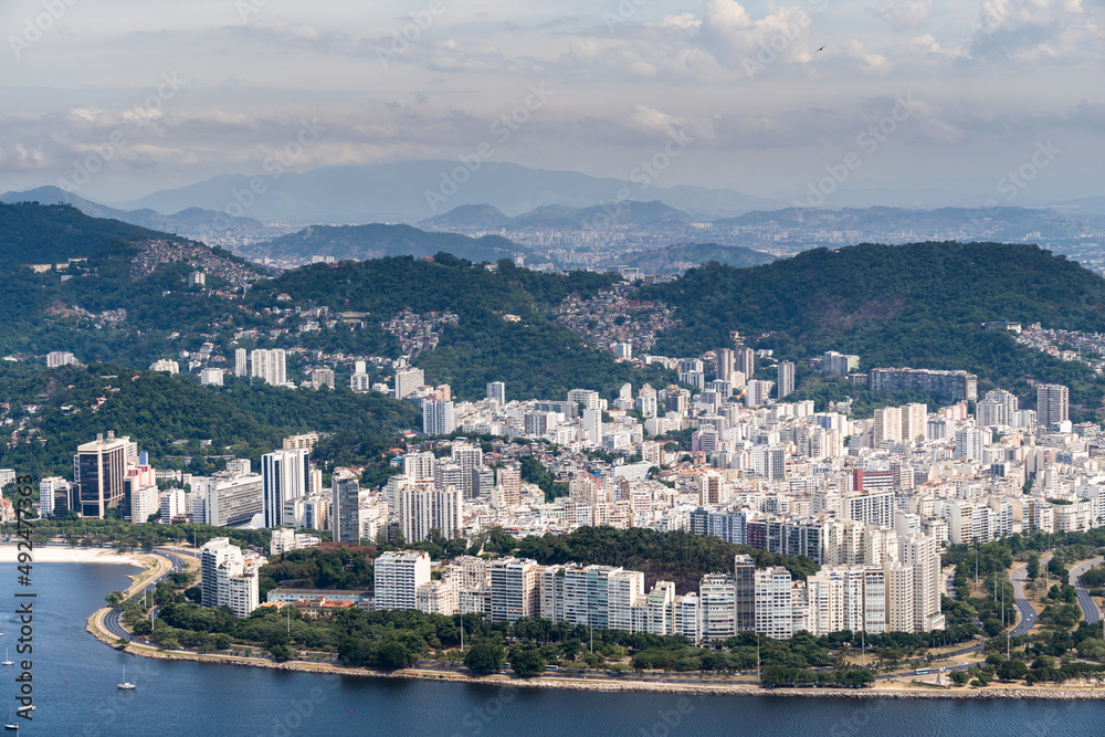 Aerial image of Botafogo and Flamengo cove and beach with its buildings, boats and landscape. Immensity of the city of Rio de Janeiro, Brazil in the background