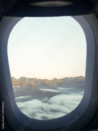 inside the plane  looking through a window