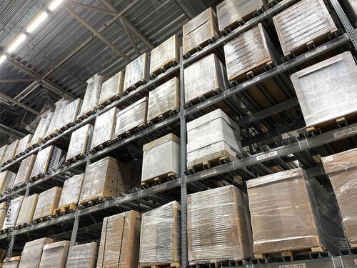 production warehouse storage with huge boxes packages on the shelves