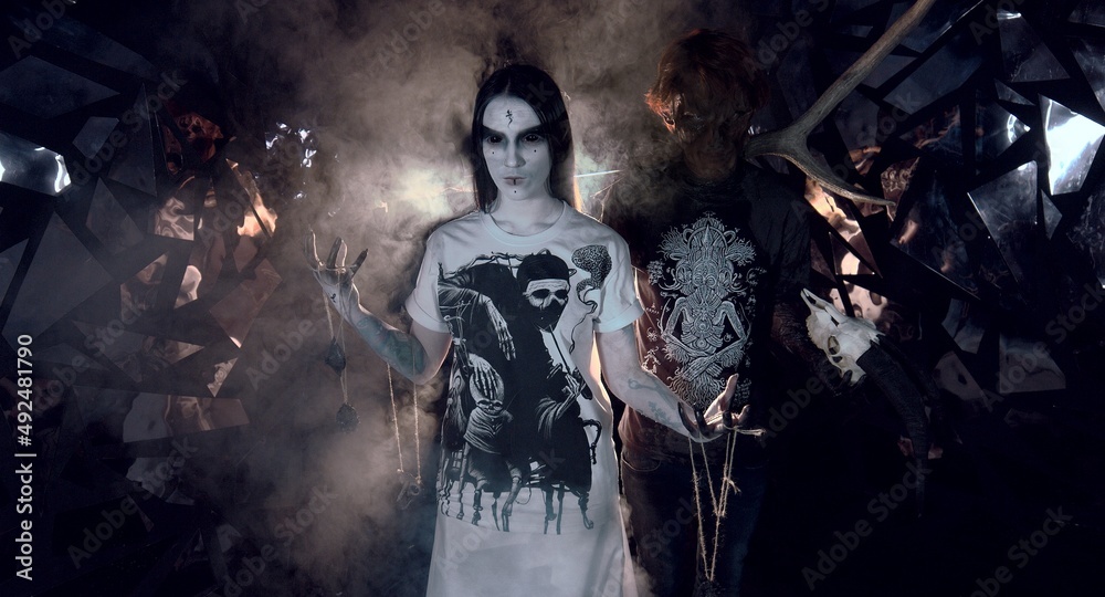 Fototapeta premium sorcerers stands in smoke. voodoo rite