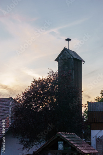 Germany air raid siren on a roof of a wooden tower in village for catastrophic and fire alarm photo