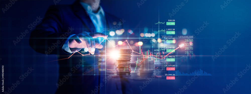 Businessman touching graph growth and analyzing finance sales data with economic growth chart of financial by investment in valuable asset, Economy, Banking and stock market.