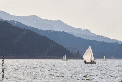 Sailboat preparing to sail on the lake