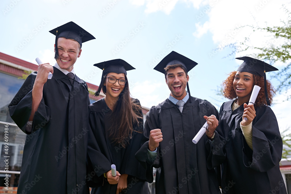 Hard work paid off. Shot of excited university students on graduation day. Hard work paid off. Shot of excited university students on graduation day.