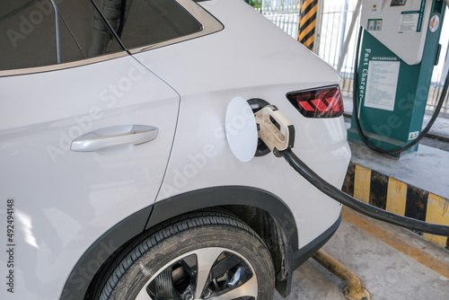 Charging new energy electric vehicles