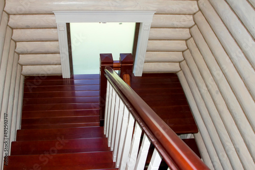 Inner staircase in a wooden house under construction