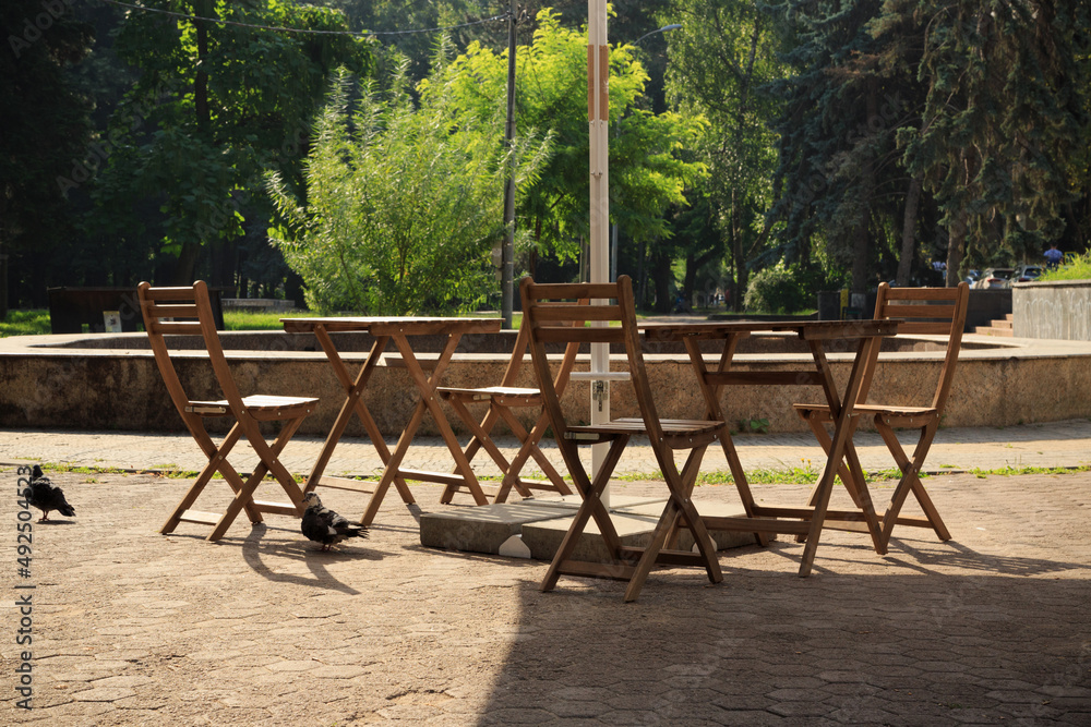 Chairs and tables in the park.