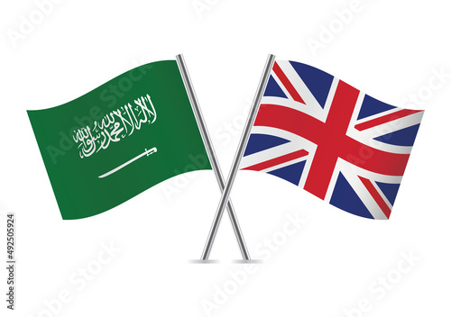 Saudi Arabia and Britain crossed flags. Saudi Arabian and British flags isolated on white background. Vector icon set. Vector illustration.
