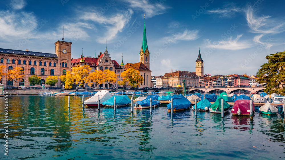 Incredible morning view of Fraumunster Church. Exciting autumn cityscape of Zurich, Switzerland, Europe. Stunning landscape of Limmat River. Traveling concept background.
