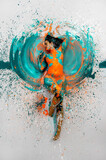 top view to expressive sexy naked woman lying elegant on the floor in turquoise blue orange color abstractly painted bodypainting woman on the splashed ground