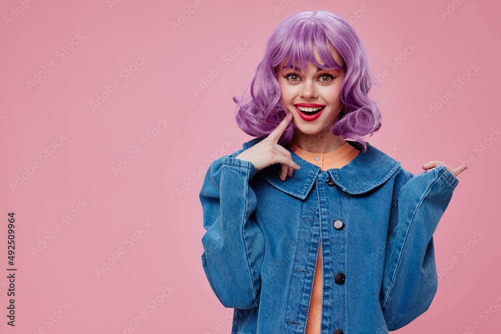 Beautiful fashionable girl purple hairstyle red lips denim jacket fun color background unaltered Beautiful fashionable girl purple hairstyle red lips denim jacket fun color background unaltered