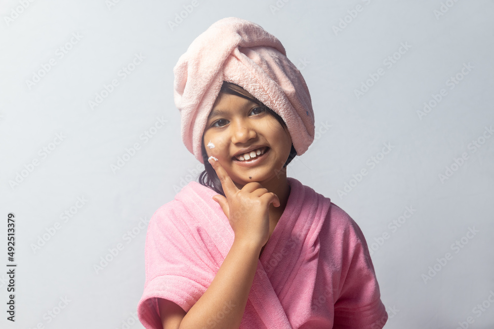 Girl child in pink bathrobe Girl child in pink bathrobe