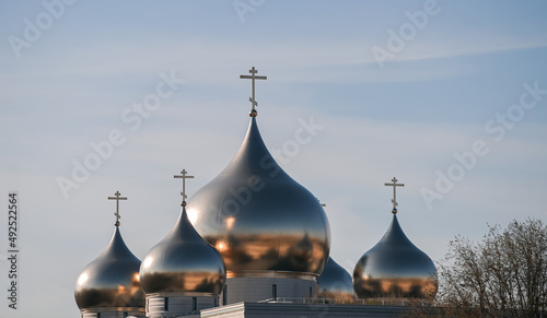 Orthodox old rite crosses on top of a church from Paris, France, in a sunny day