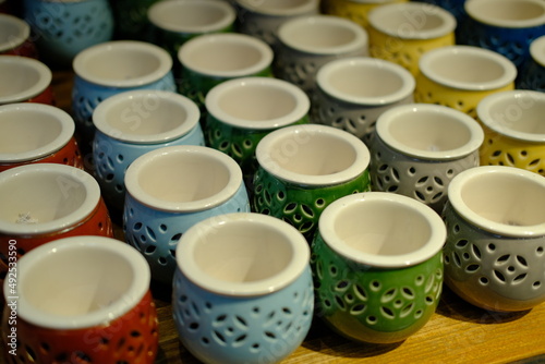 Colorful ceramic mugs in pattern 