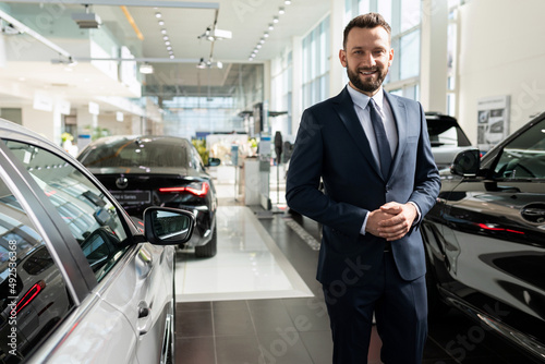 the concept of an individual approach to each client in a car dealership when buying a new car on credit or leasing photo