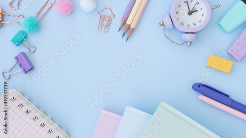 Stationery in pastel colors on a light blue background