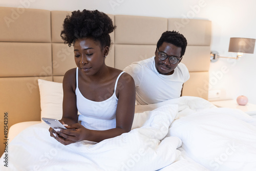 Photos Tired frustrated African woman ignores angry black despot husband who quarrels b