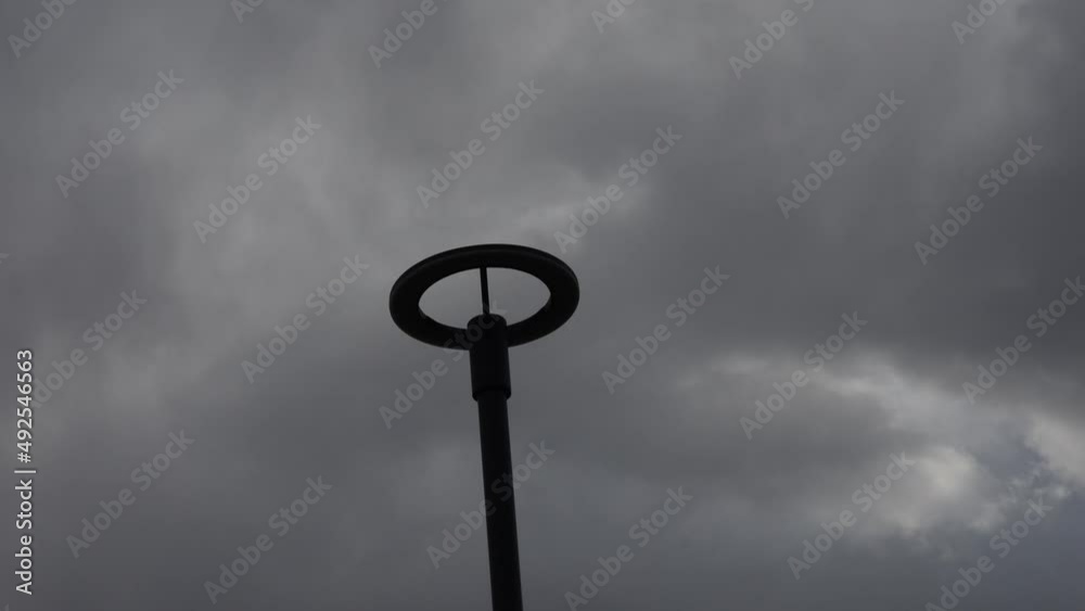 old lamp post and clouds.Time-lapse video old lamp post and clouds.Time-lapse video
