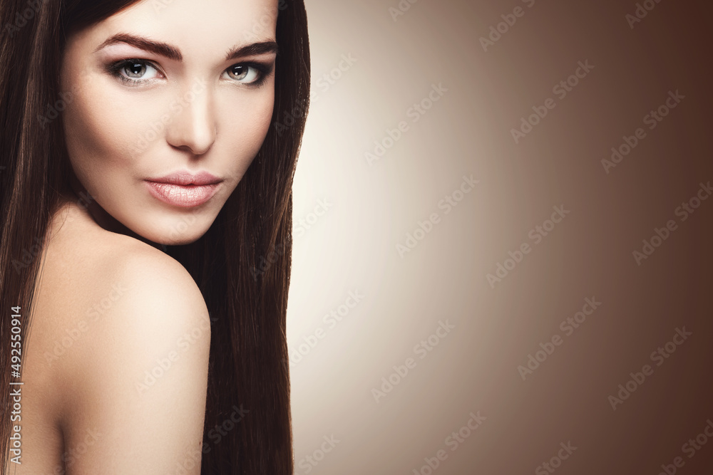 Beautiful young woman with straight long hair