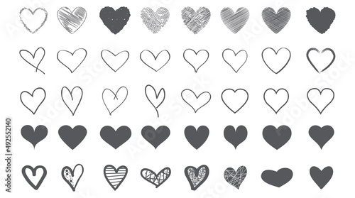 Heart contour vector. Black hand drawn love icon isolated. Paint brush stroke heart icon. Hand drawn vector for love logo, heart symbol, doodle icon and Valentine's day. Painted grunge vector shape photo