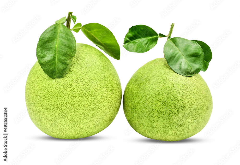 Green pomelo fruit with leaves isolated on white background with