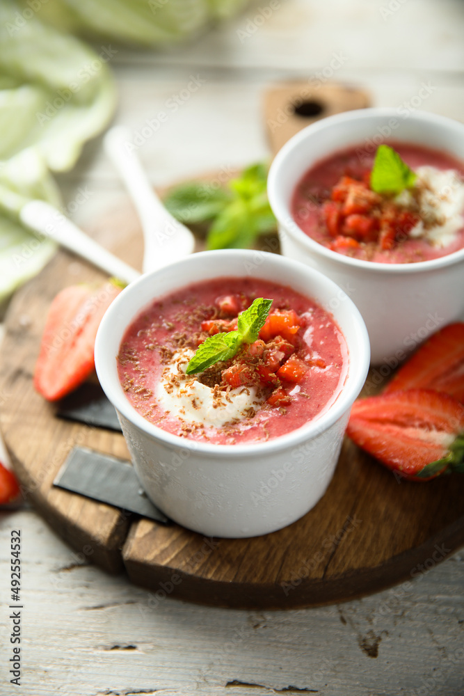 Homemade strawberry soup with chocolate and cream Homemade strawberry soup with chocolate and cream