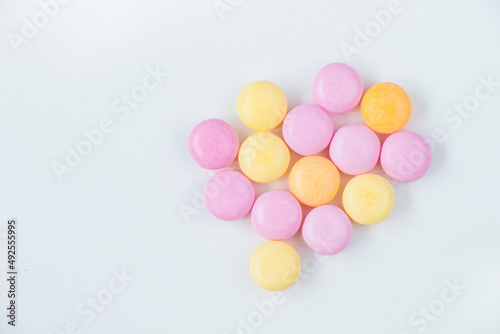 Sweet colorful confectionery, candy on the white background © taidundua