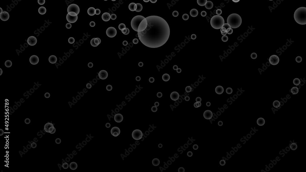 Black background with falling white bubbles. Simple high definition animation with objects falling in a perfect, seamless loop. Black background with falling white bubbles. Simple high definition animation with objects falling in a perfect, seamless loop.