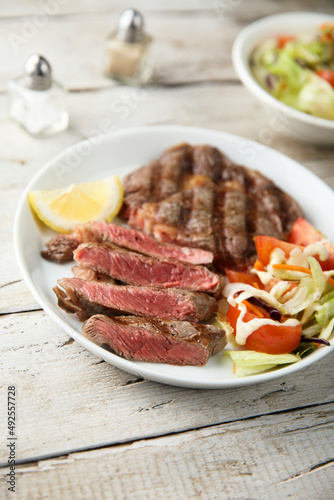 Grilled beef steak with vegetable salad