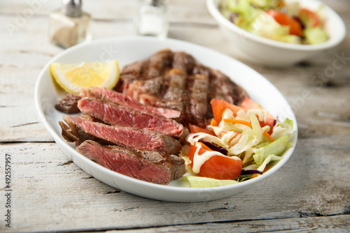 Grilled beef steak with vegetable salad