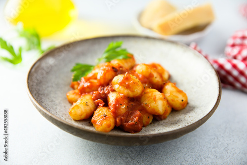 Homemade gnocchi with tomato sauce and cheese