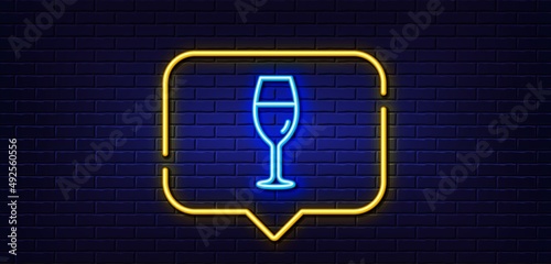 Neon light speech bubble. Wine glass line icon. Burgundy glass sign. Neon light background. Wineglass glow line. Brick wall banner. Vector