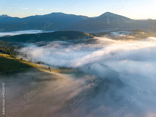 Morning fog in the Ukrainian Carpathians. Aerial drone view.