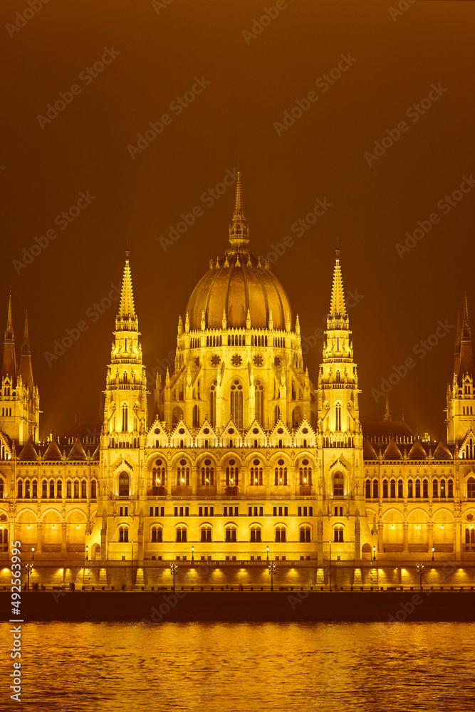 Hungarian parliament and Danube river by night in Budapest