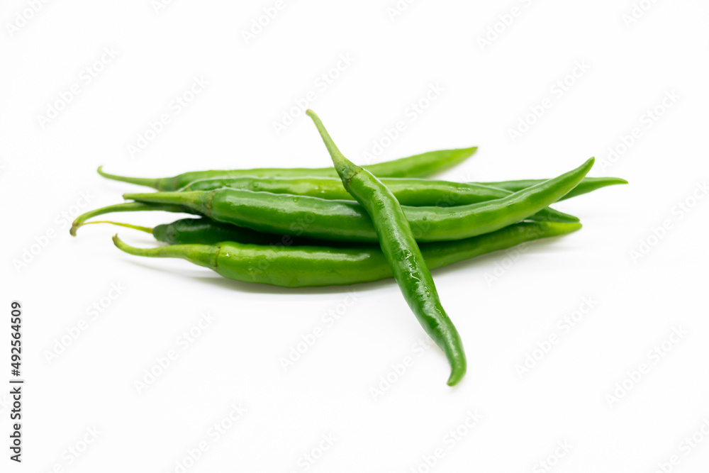 Green hot chili peppers isolated on white background Green hot chili peppers isolated on white background