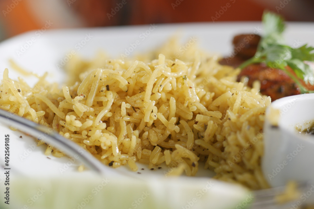cooked rice in a bowl on table, close up,