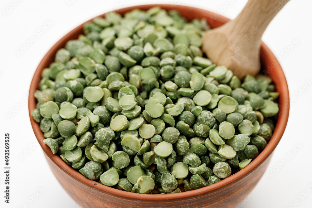 Green pea groats isolated on a white background. High quality photo Green pea groats isolated on a white background. High quality photo