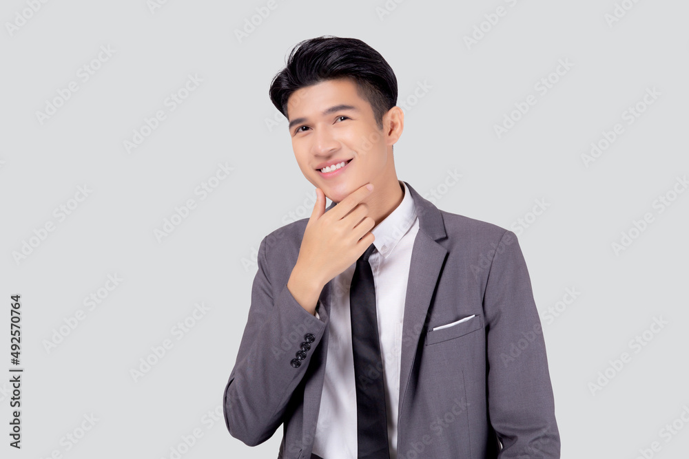 Portrait young asian business man in suit with smart thinking idea isolated on white background, businessman standing and planning for success, handsome manager or executive, emotion and expression. Portrait young asian business man in suit with smart thinking idea isolated on white background, businessman standing and planning for success, handsome manager or executive, emotion and expression.